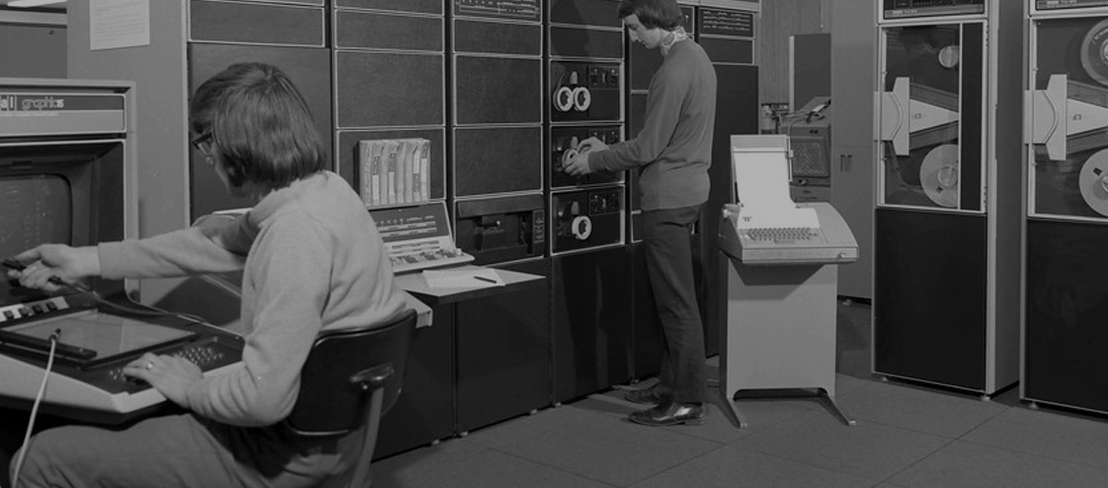 Old fashioned photo of people working in server hosting